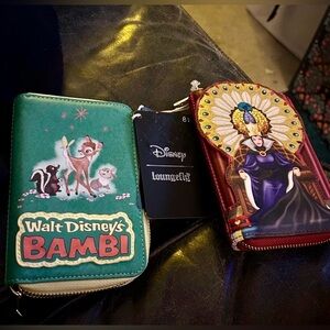 Two wallets from the Disney Archives Teal Wallet with Bambi Design & red wallet.